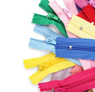 Stylish different zippers on white background