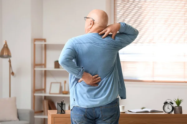Senior Man Suffering Back Pain Table Home — Stock Photo, Image
