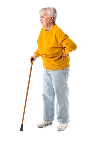Seniorin Mit Gehstock Leidet Unter Rückenschmerzen Auf Weißem Hintergrund — Stockfoto