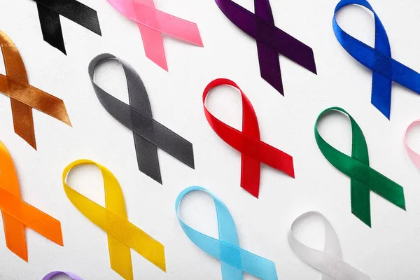 Set Different Awareness Ribbons Light Background Closeup World Cancer Day — Foto de Stock