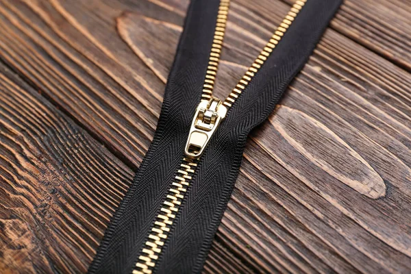 Stylish Black Zipper Wooden Background — Stock Photo, Image