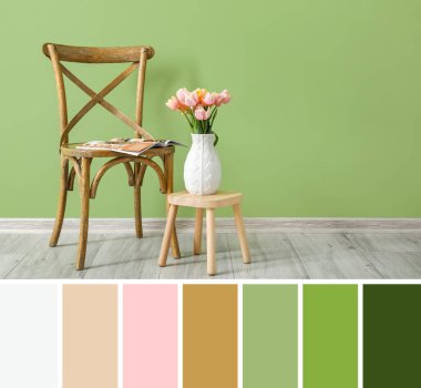 İçinde lale çiçekleri olan küçük bir masa ve yeşil duvarın yanındaki şarjörlü ahşap sandalye. Farklı renk örnekleri