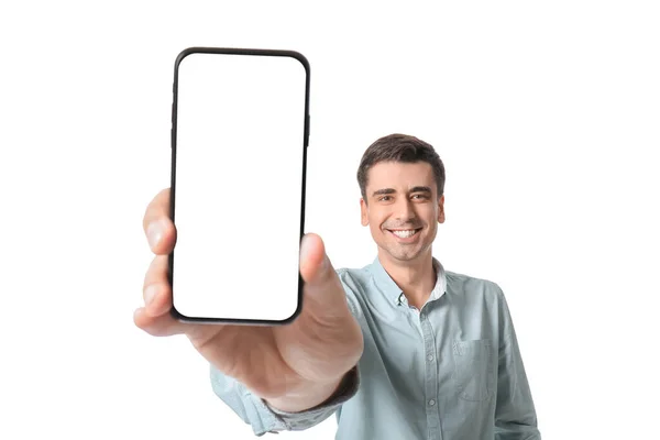 Νεαρός Άνδρας Δείχνει Κινητό Τηλέφωνο Κενή Οθόνη Λευκό Φόντο — Φωτογραφία Αρχείου