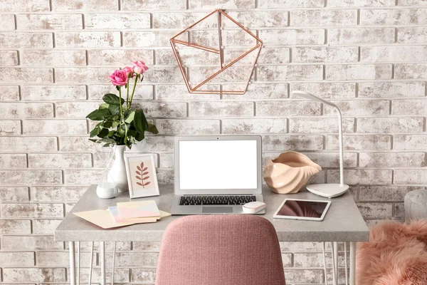 Stylish Workplace Modern Laptop Tablet Computer Decor Light Brick Wall — Stock Photo, Image