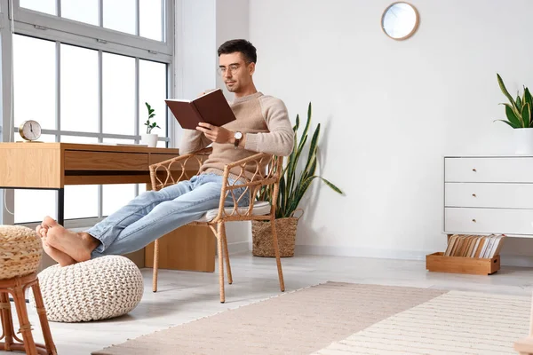 Young Barefooted Man Reading Book Home — Stock Photo, Image