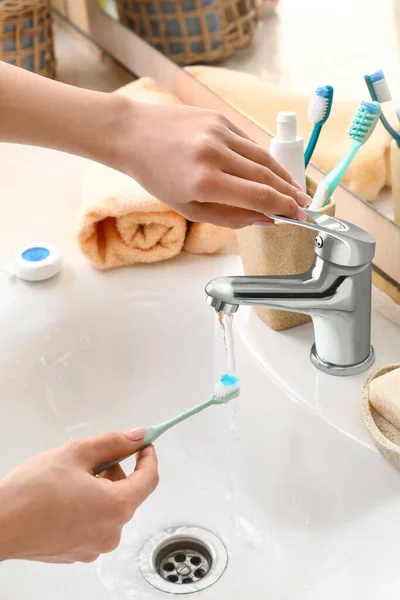 Woman Holding Toothbrush Paste Water Flow Sink Closeup — Stock Photo, Image