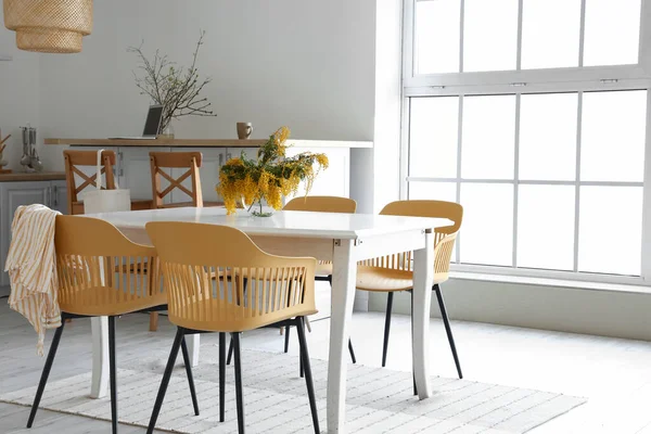 Stylish Interior Light Kitchen Mimosa Flowers Dining Table — Stock Photo, Image