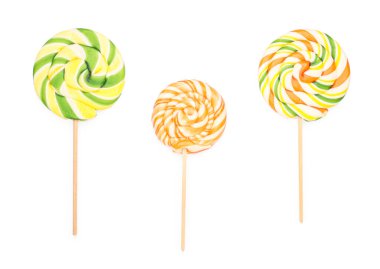 Three round lollipops on white background