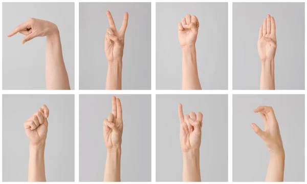 Руки Показывающие Разные Буквы Сером Фоне Алфавит Жестового Языка — стоковое фото