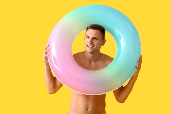 Attractive Young Man Inflatable Ring Yellow Background — Stock Photo, Image