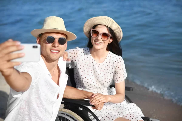 Happy Woman Physical Disability Her Boyfriend Taking Selfie Sea Resort — Stock Photo, Image