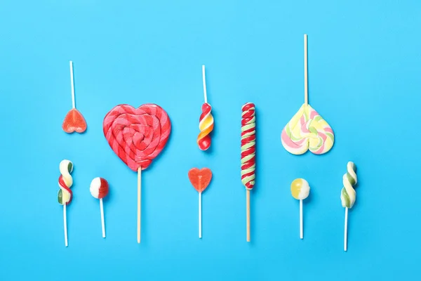 Many Different Lollipops Blue Background — Stock Photo, Image