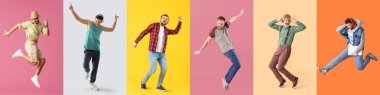 Renkli arka planda mutlu zıplayan ve dans eden adamlar.