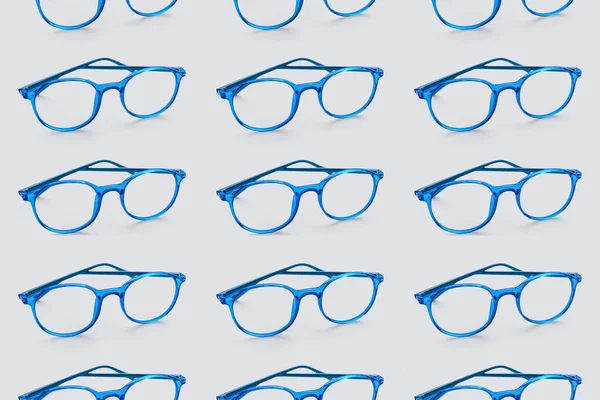 Stylish Eyeglasses Light Blue Background Pattern Design — Stock Photo, Image