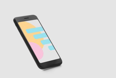 Işık arkaplan üzerinde modern akıllı telefon