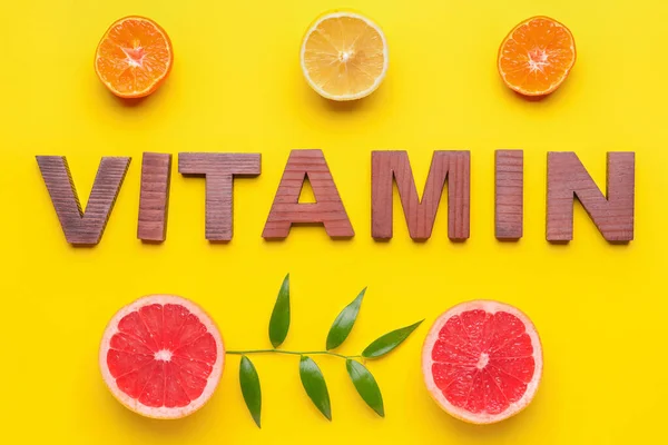 Text Vitamin Made Wooden Letters Citrus Fruits Yellow Background — 스톡 사진