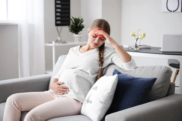 Young Pregnant Woman Headache Sitting Sofa Home — стоковое фото