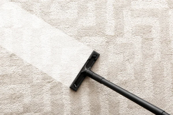 Vacuum Cleaner Removing Dirt Light Carpet Top View — Stock Photo, Image
