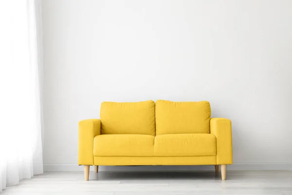 Comfortable Yellow Sofa Light Wall — Foto Stock