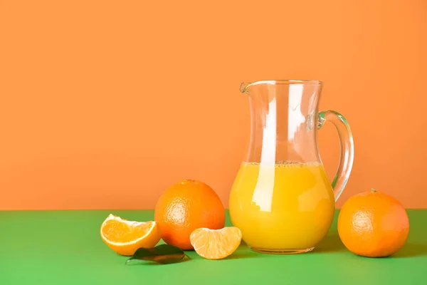 Jug Fresh Tangerine Juice Color Background — Stock Photo, Image