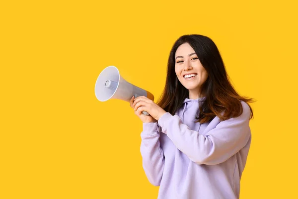 Inviting Young Asian Woman Megaphone Yellow Background — Stock Photo, Image