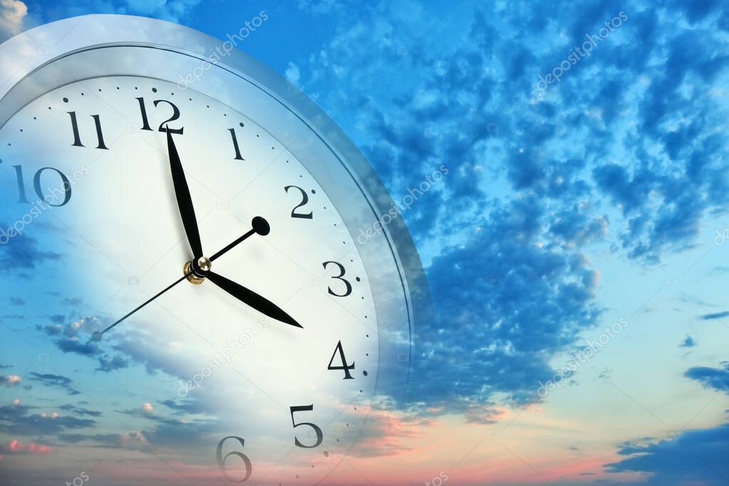 Double exposure of clock and beautiful sky. Concept of time