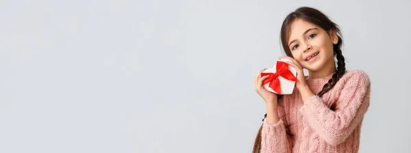 Funny Little Girl Holding Heart Shaped Gift Box Light Background — Photo