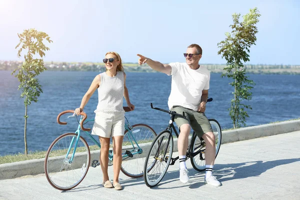 Mature Couple Bicycles Walking River Bank Summer Day — Photo