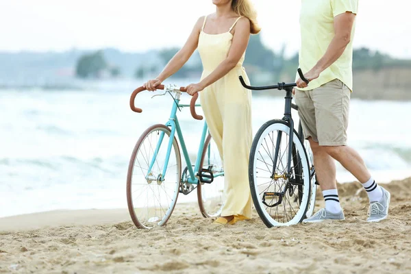 Mature Couple Bicycles Walking Sea Beach Summer Day — Zdjęcie stockowe