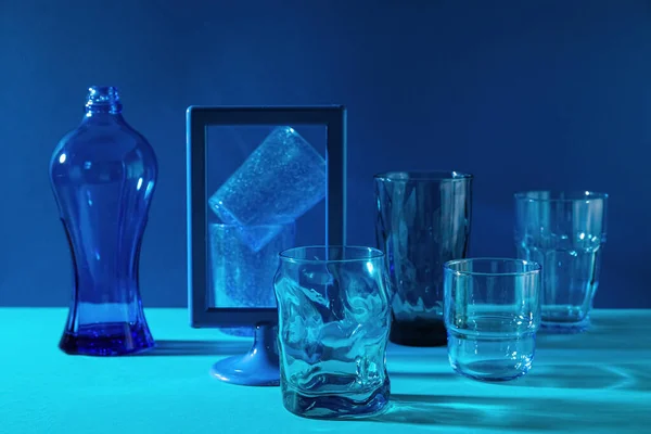 Stylish Empty Glasses Blue Background — Foto Stock