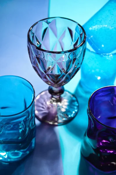 Stylish Empty Glasses Color Background Closeup — Foto Stock