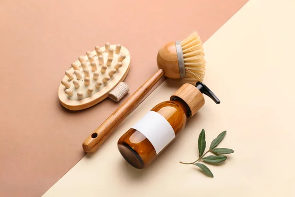 Bottle Cosmetic Product Massage Brushes Color Background — Stock Photo, Image