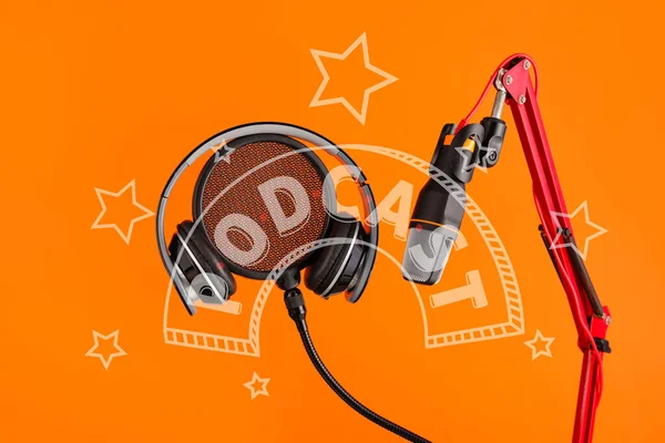 Modern Microphone Pop Filter Headphones Orange Background Word Podcast — Zdjęcie stockowe