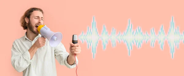 Screaming Young Man Megaphone Modern Microphone Pink Background — Zdjęcie stockowe