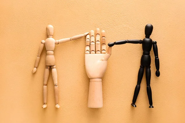 Wooden Hand Mannequins Beige Background Racism Concept — Stock Photo, Image