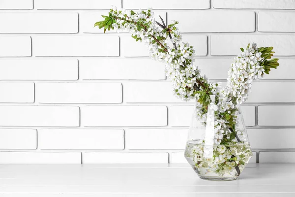Vase Beautiful Blooming Tree Branches Wooden Table White Brick Wall — Stock Photo, Image