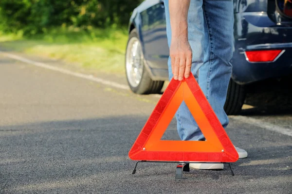 Man Putting Emergency Stop Sign Road — Stock Photo, Image