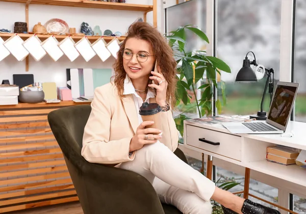Female Business Owner Talking Phone Drinking Coffee Her Shop — Stock Photo, Image