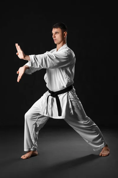 Man Practicing Karate Dark Background — Fotografia de Stock