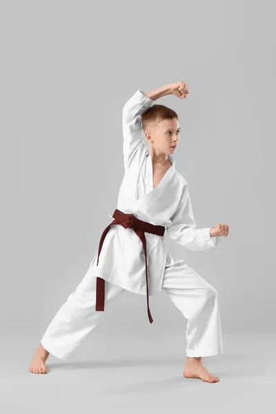 Boy Practicing Karate Light Background — Foto de Stock