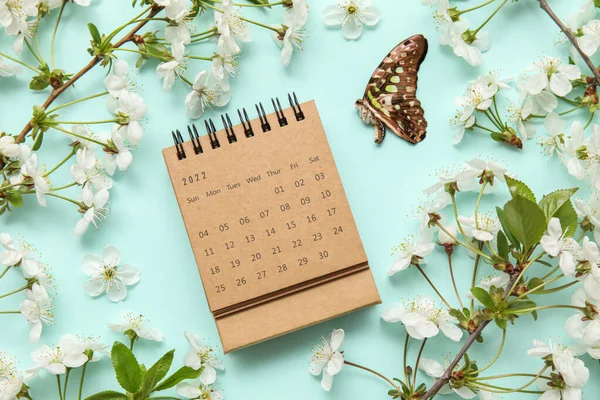 Blooming Spring Branches Calendar Butterfly Turquoise Background —  Fotos de Stock