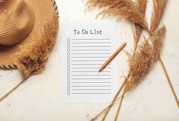 Blank List Pen Hat Reed Flowers Light Background — Stockfoto