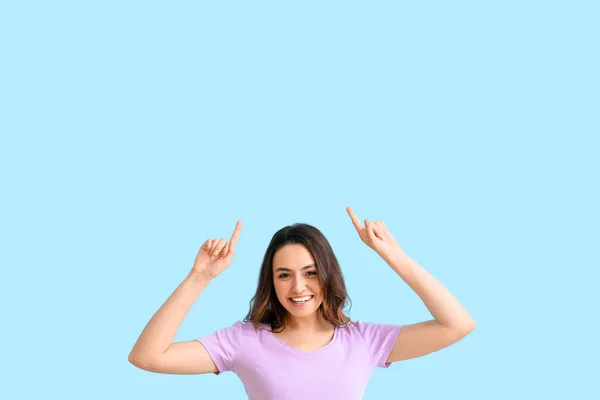 Young Woman Pointing Something Color Background — Stock Fotó