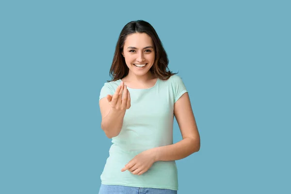 Young Woman Showing Come Here Gesture Color Background — Stock Fotó