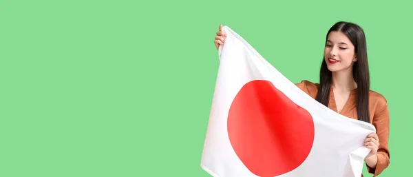 Beautiful Young Woman Holding Flag Japan Green Background Space Text — Stok Foto
