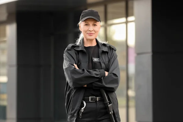 Female security guard outdoors