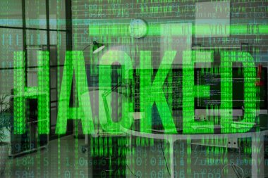 Double exposure of programmer's office, computer code and word HACKED 