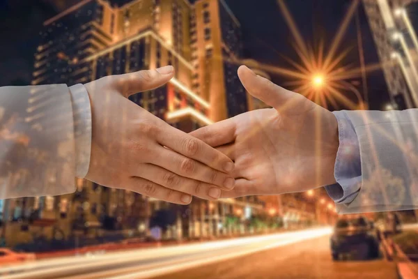 Double Exposure Businessmen Shaking Hands Blurred Night City — Stock Photo, Image