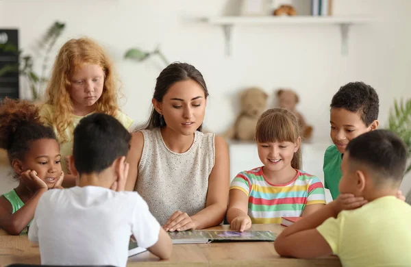 Little Children Having Literature Lesson Teacher Classroom — Fotografia de Stock