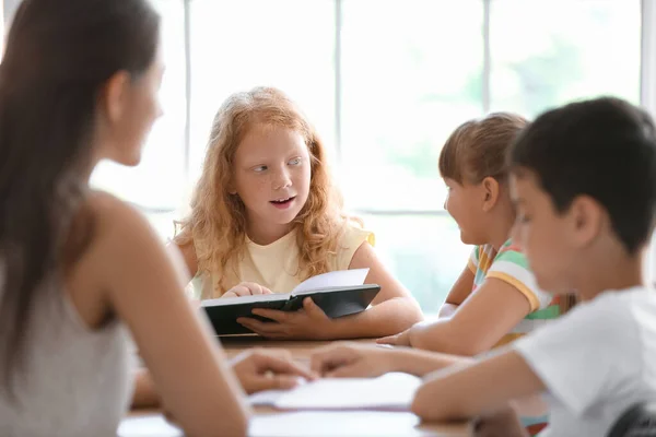 Little Redhead Girl Reading Book Literature Lesson Classroom — Stock Fotó